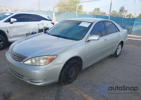 2003 Toyota Camry Le from USA, damaged, VIN JTDBE32K230237006